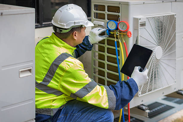 Professional Air Duct Cleaning technician working in Tipton, IA